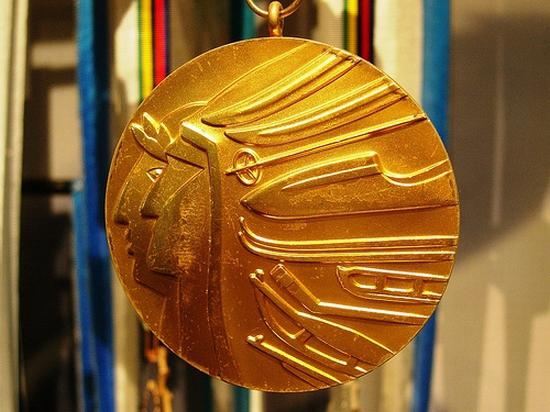 сколько золота в золотой олимпийской медали