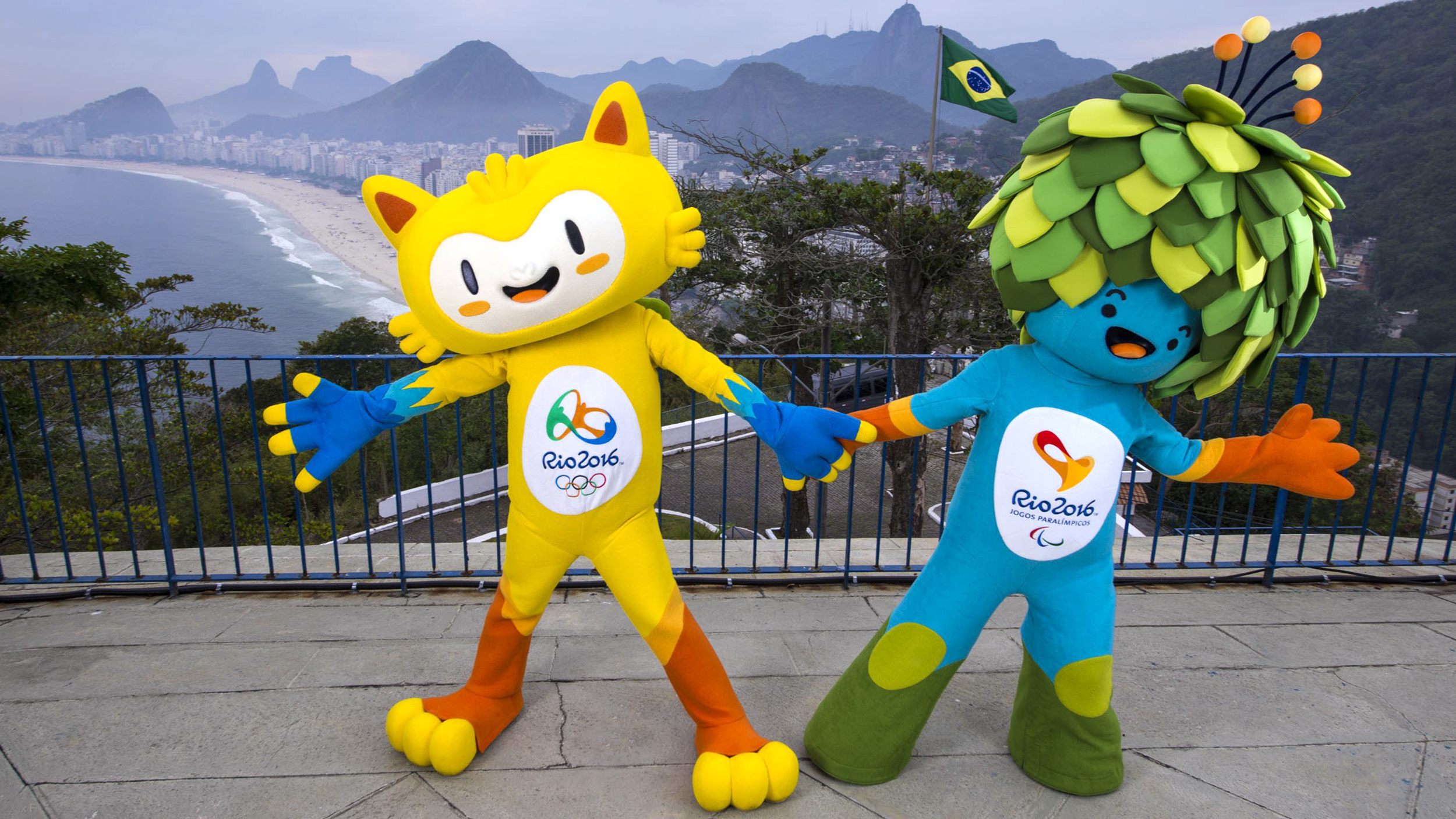 The unnamed mascots of the Rio 2016 Olympic and Paralympic Games are pictured with the Copacabana beach in the background during their first appearance in Rio de Janeiro, November 23, 2014, in this handout courtesy of the Brazil Olympic Committee (COB) These mascots of Rio 2016 Olympic and Paralympic Games are inspired by the Brazilian fauna and flora, and their names will be decided through a public vote, according to the COB. REUTERS/Alex Ferro/COB/Handout via Reuters (BRAZIL - Tags: SPORT OLYMPICS SOCIETY) ATTENTION EDITORS - THIS PICTURE WAS PROVIDED BY A THIRD PARTY. REUTERS IS UNABLE TO INDEPENDENTLY VERIFY THE AUTHENTICITY, CONTENT, LOCATION OR DATE OF THIS IMAGE. FOR EDITORIAL USE ONLY. NOT FOR SALE FOR MARKETING OR ADVERTISING CAMPAIGNS. THIS PICTURE IS DISTRIBUTED EXACTLY AS RECEIVED BY REUTERS, AS A SERVICE TO CLIENTS