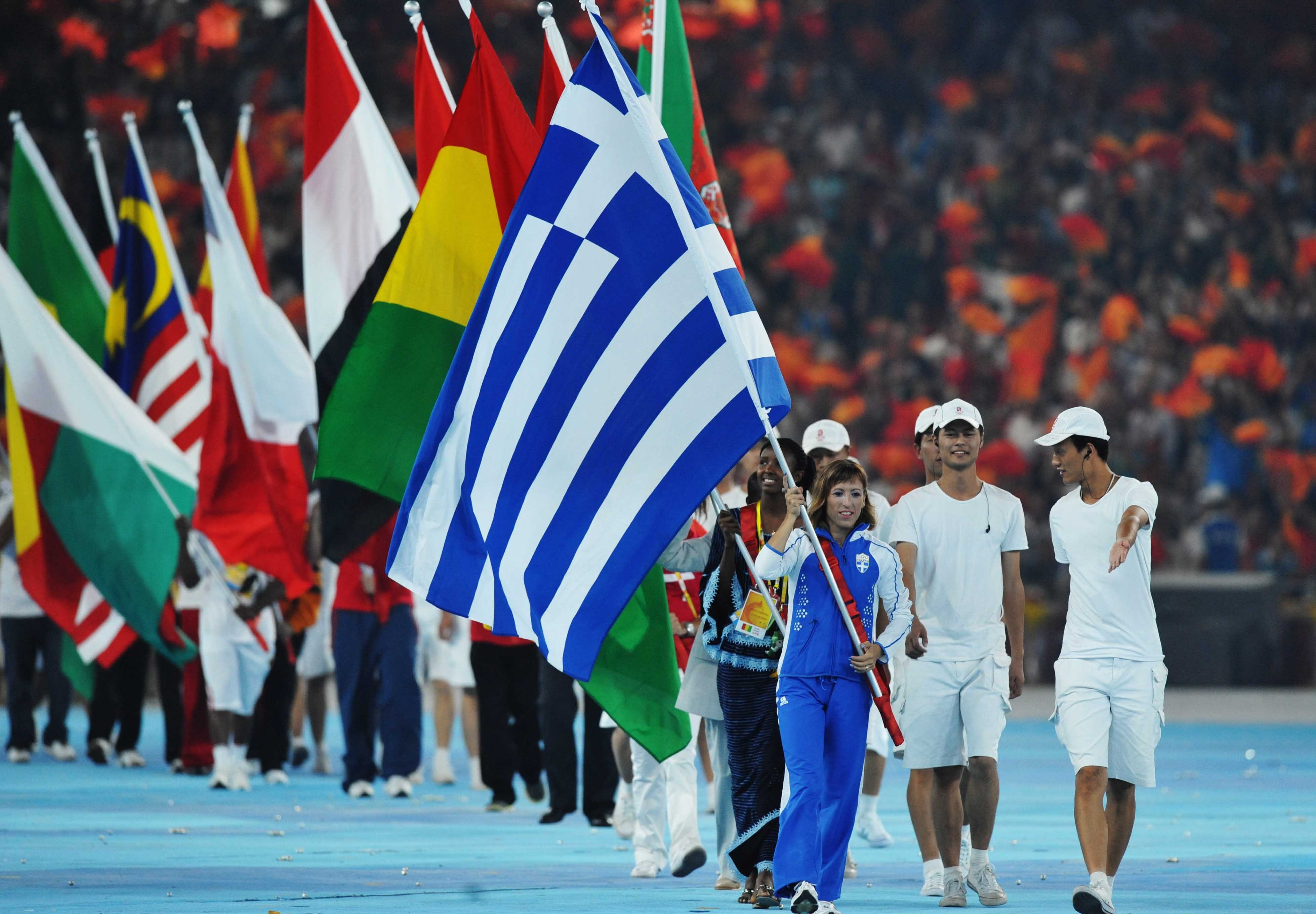 Олимпийские сборные стран. Олимпийские игры. Спортсмен с флагом. Парад Олимпийских игр. Спортсмены из разных стран.